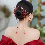épingle cheveux pompons rouges