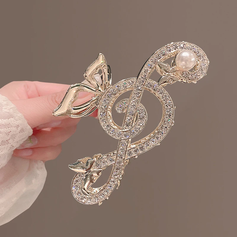 Bijou de cheveux note de musique